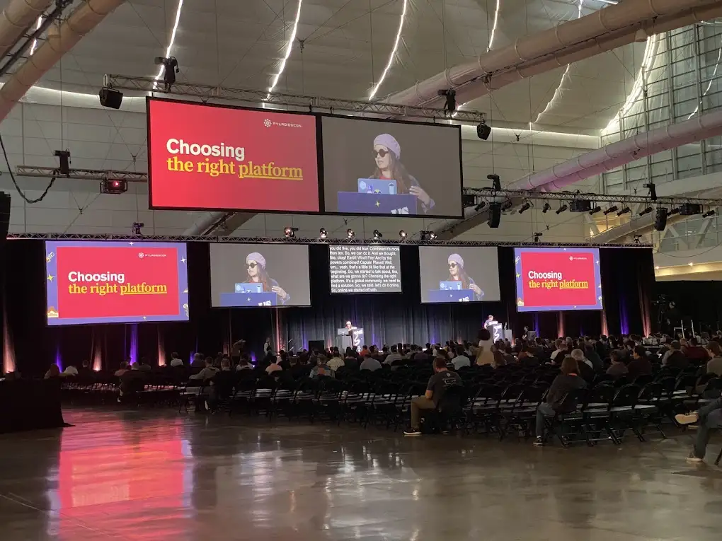 Georgi Ker presenting a lightning talk about PyLadiesCon at PyCon US